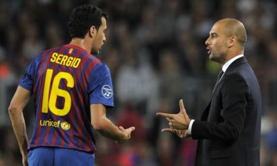 Sergio Busquets and Pep Guardiola