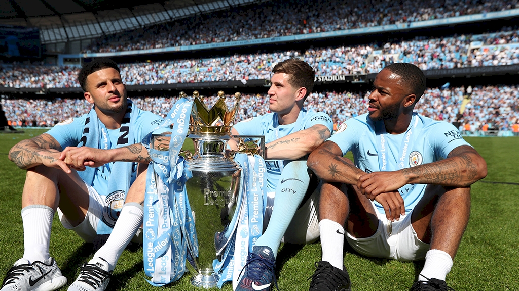 stones_walker_sterling_premier_league_trophy_2017_18