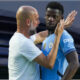 Pep-Guardiola-Luke-Mbete-Manchester-City